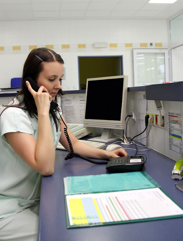 Person on phone at her desk